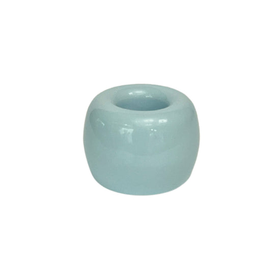 small ceramic toothbrush holder in glossy blue finish