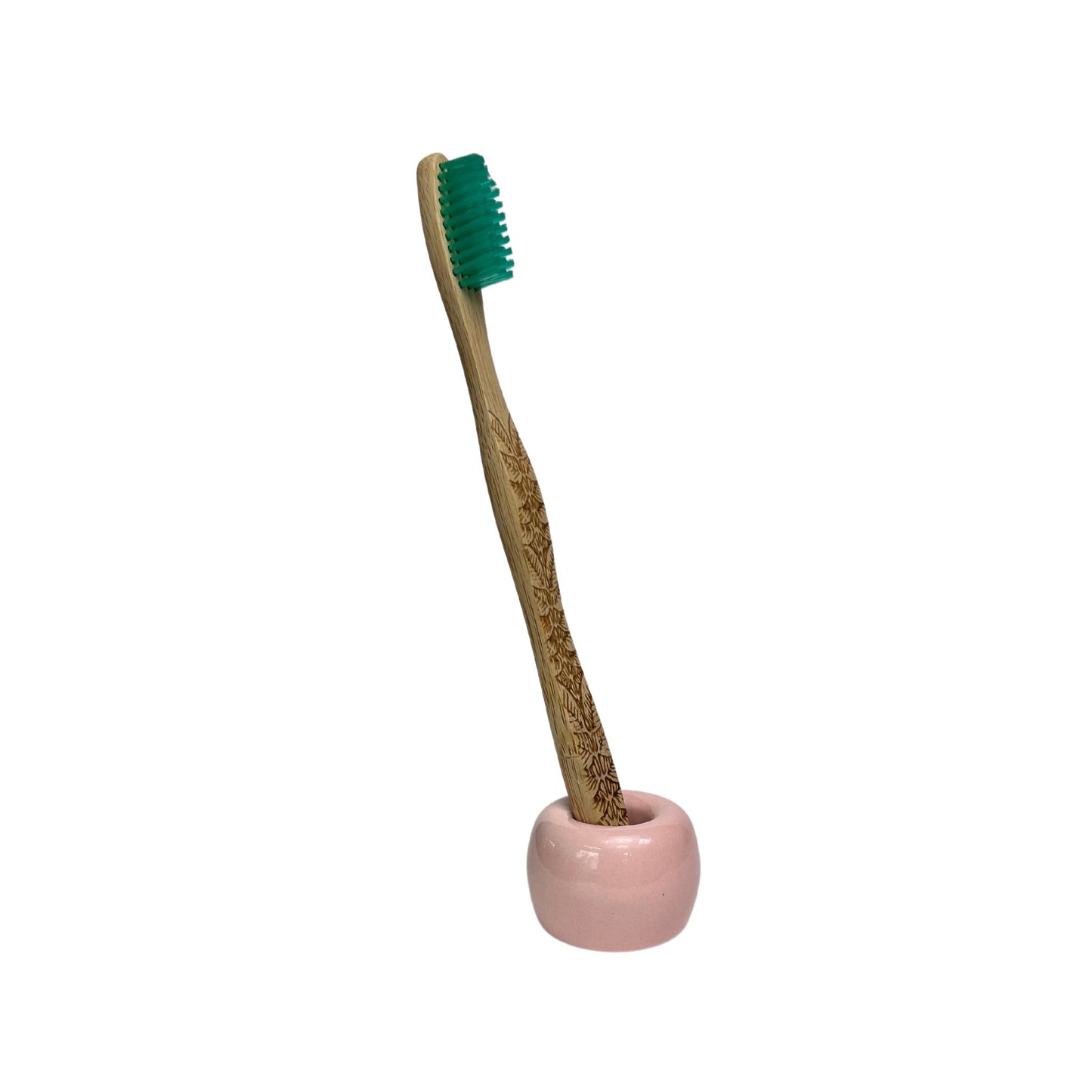 Load image into Gallery viewer, small ceramic toothbrush holder in glossy pink finish holding a bamboo toothbrush
